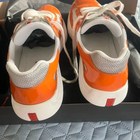 Authentic & beautiful Prada America Vibrant Orange and White  display picture 1